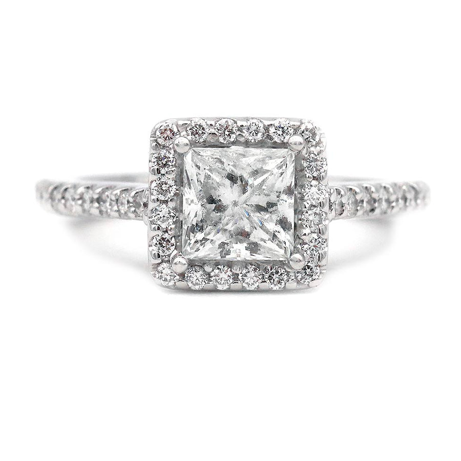 Vintage 1980s princess cut diamond halo engagement ring in 14K white gold with square halo and pavé band