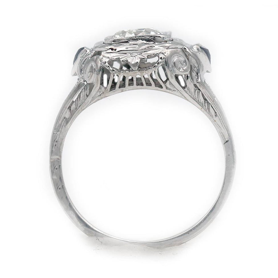 Art Deco engagement ring .51 carat GIA certified old European cut diamond G SI1 with triangle sapphire accents in 18K white gold circa 1930s