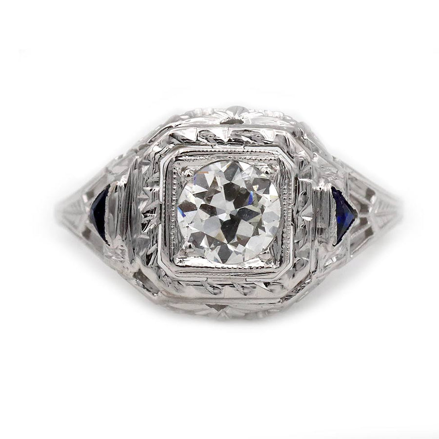 Art Deco engagement ring .51 carat GIA certified old European cut diamond G SI1 with triangle sapphire accents in 18K white gold circa 1930s