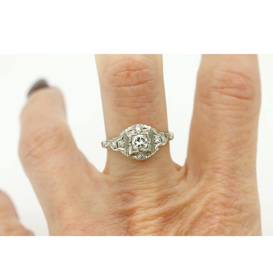 art deco old european cut diamond engagement ring in 18 kt white gold worn on hand circa 1930s