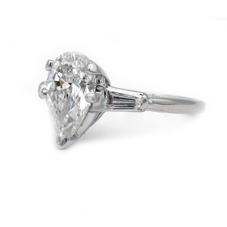Vintage pear shape three stone engagement ring 2.51 carat IGI certified lab grown diamond E VS1 in platinum side view