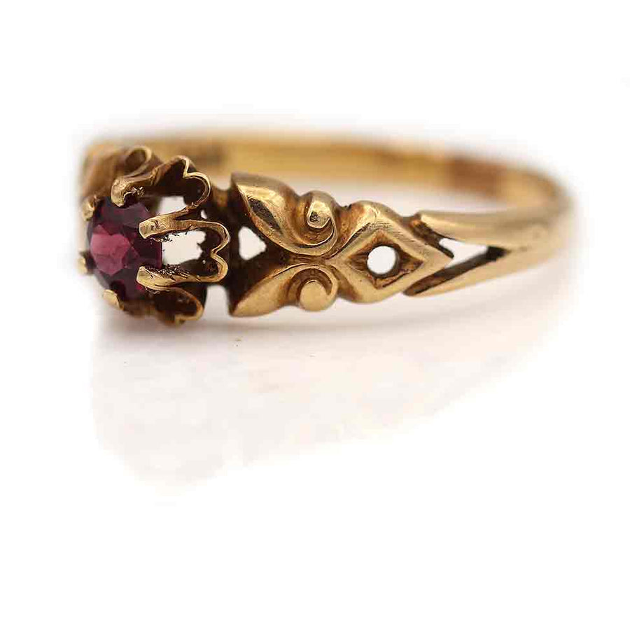 Antique Victorian garnet engagement ring with round cut purple garnet
