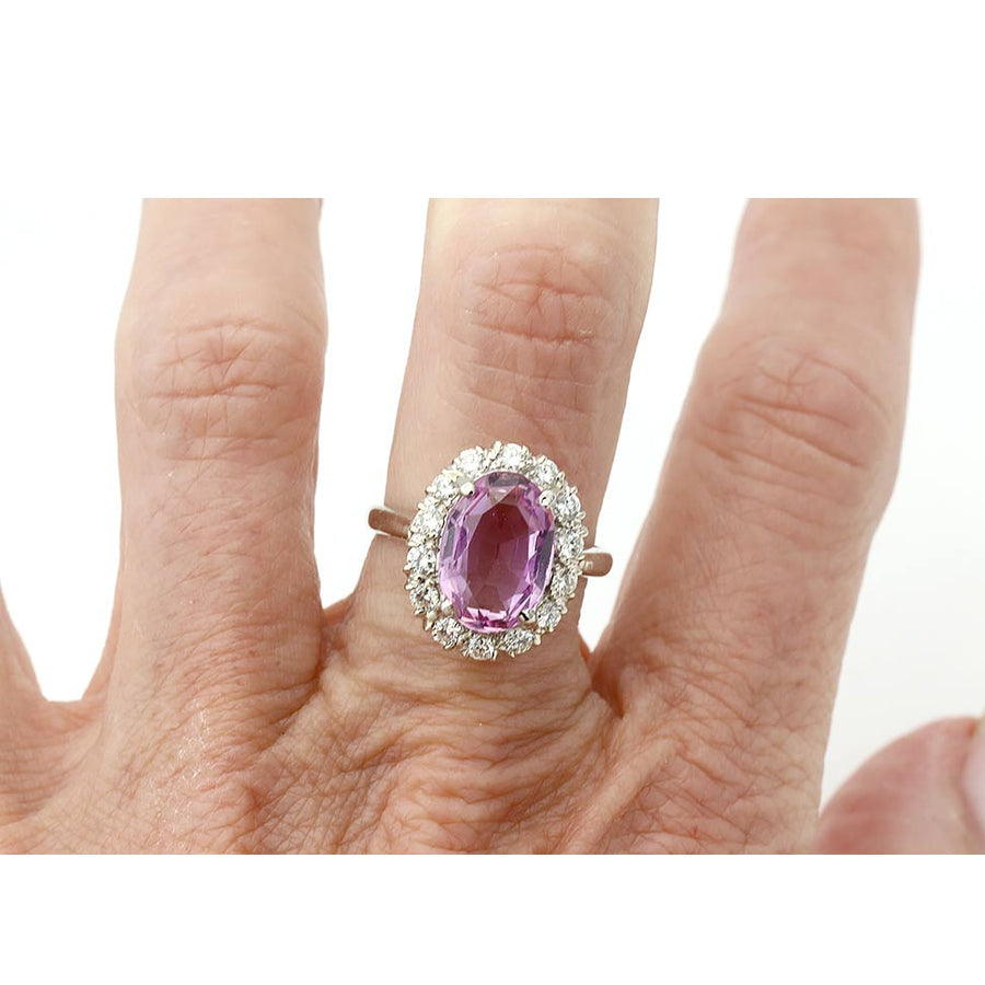 Mid-century engagement ring 3.00 carat natural pink tourmaline with round diamond halo in 14K white gold circa 1980s on hand