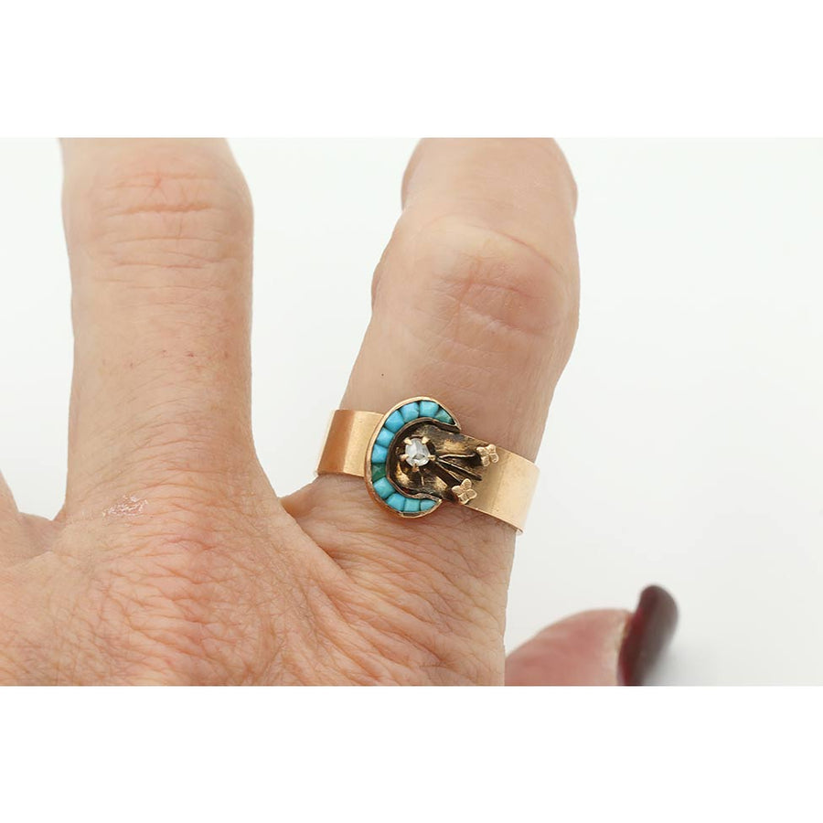 Retro turquoise and rose cut diamond ring in 14 karat rose gold worn on hand