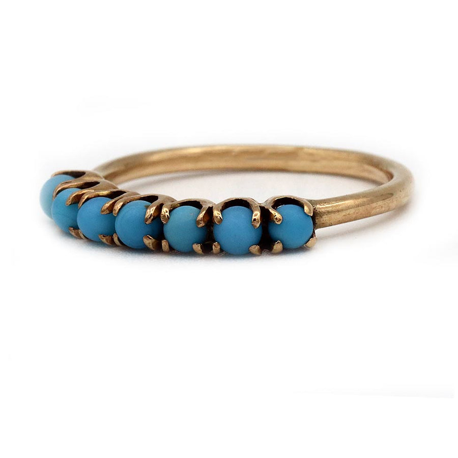 Side profile of Victorian turquoise wedding band showing vintage setting and cabochons