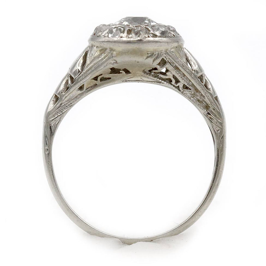 Ann: .70 CTW Old Mine Cut Diamond Halo Engagement Ring (1950s)