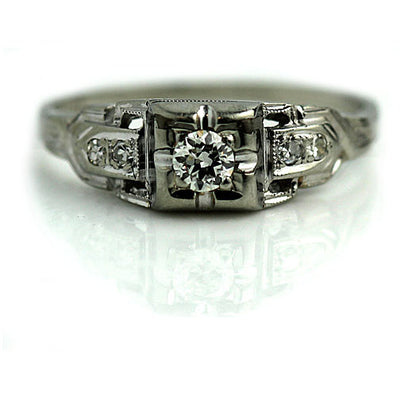 Delicate Engagement Ring with Side Diamonds