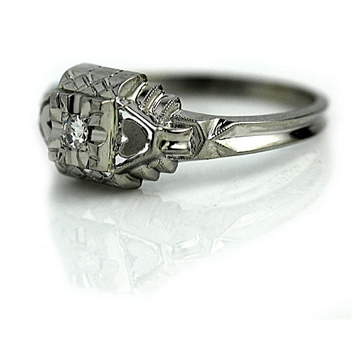 Solitaire Diamond Engagement Ring with Heart Motif