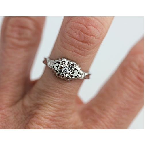 Solitaire Diamond Engagement Ring with Heart Motif
