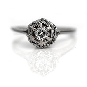 Vintage Solitaire Engagement Ring with Heart Motif