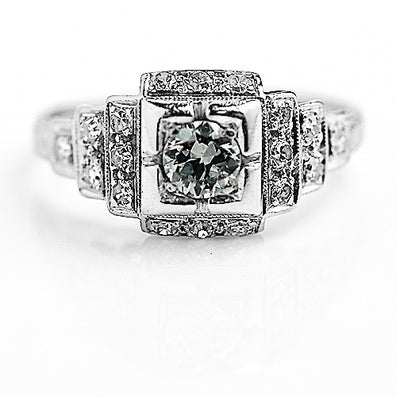 Art Deco .71 CTW Halo Engagement Ring with Tiered Side Stones