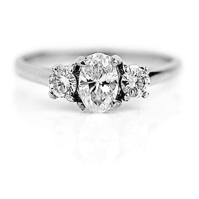 Vintage .91 CTW Oval Cut Diamond Three Stone Engagement Ring 