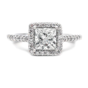 Vintage 1980s princess cut diamond halo engagement ring in 14K white gold with square halo and pavé band