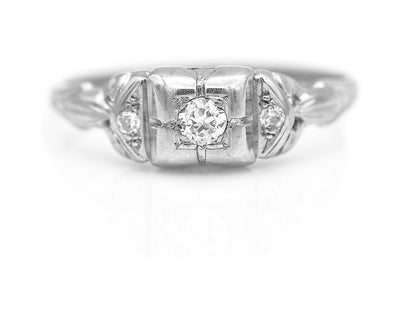 Dainty Art Deco .16 CTW Antique Engagement Ring with Side Stones