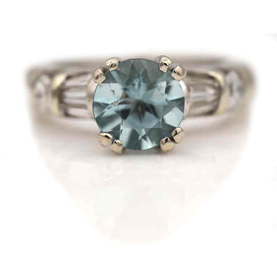Vintage 1.55 Carat Aquamarine Engagement Ring with Side Baguette and Round Diamonds