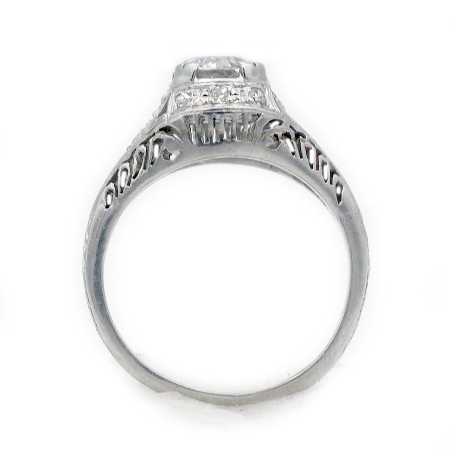 Art Deco platinum engagement ring .91 carat GIA certified old European cut diamond D I1 with milgrain engravings and open metalwork circa 1930s