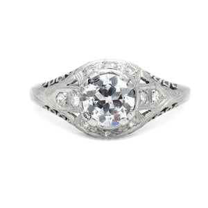 Art Deco platinum engagement ring .91 carat GIA certified old European cut diamond D I1 with milgrain engravings and open metalwork circa 1930s