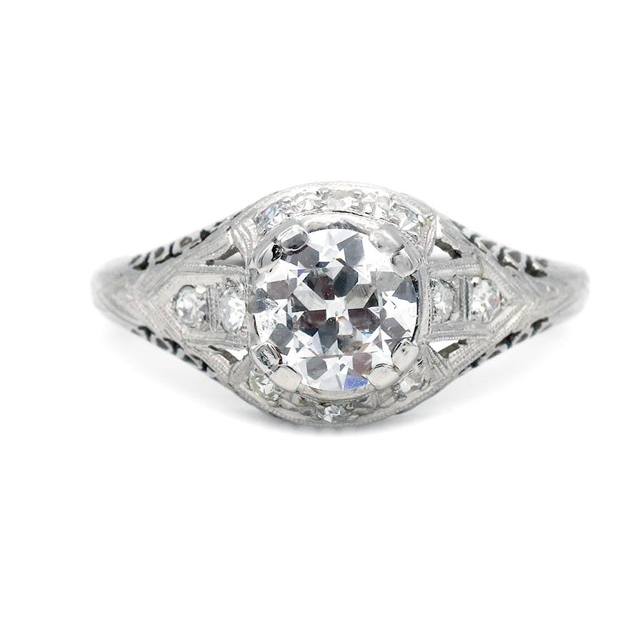 Art Deco platinum engagement ring .91 carat GIA certified old European cut diamond D I1 with milgrain engravings and open metalwork circa 1930s
