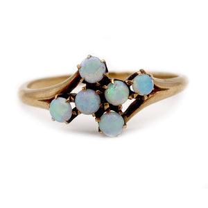 victorian opal engagement ring with six cabochon opals in 10k rose gold