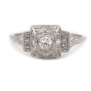 art deco bezel set old european cut diamond engagement ring in 18 kt white gold shown in a front view