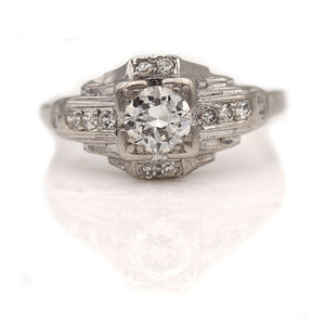 Antique .65 CTW European Cut Platinum Vintage Engagement Ring with Side Diamonds