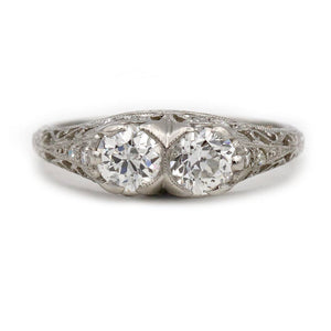art deco toi et moi platinum two stone diamond engagement ring shown in a front view