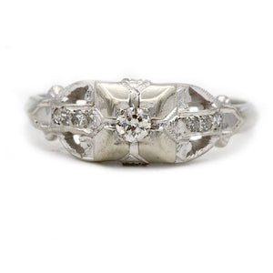 vintage art deco .15 ct old european cut diamond engagement ring in 14 kt white gold shown in a front view