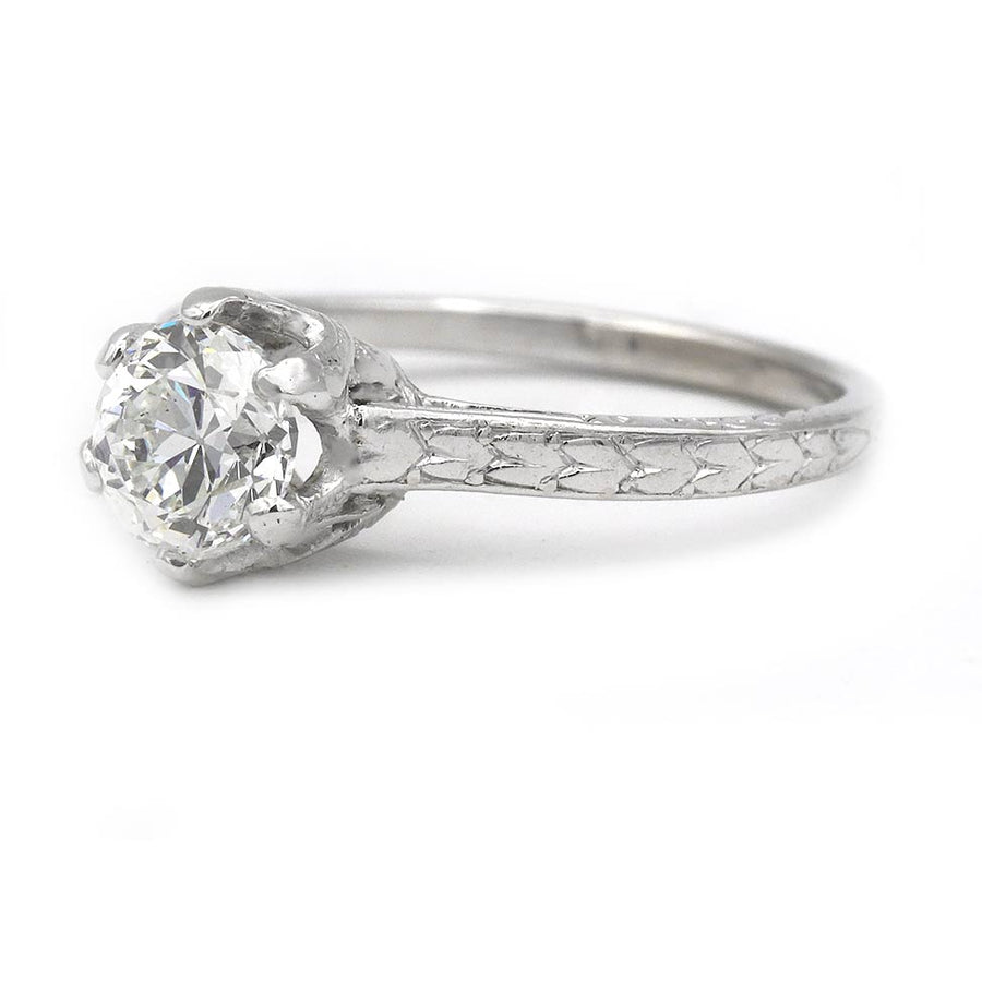 Art Deco platinum solitaire engagement ring .97 carat GIA certified old European cut diamond G SI2 six-prong setting hand engraved circa 1920s side view