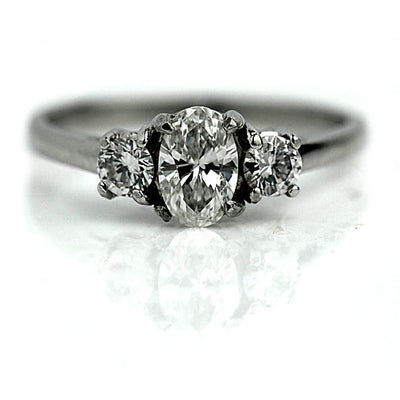 Oval Cut Diamond Engagement Ring with Side Stones