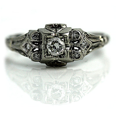 Vintage Engagement Ring with Bezel Set Diamonds