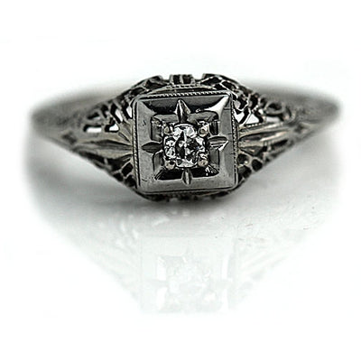 Diamond Engagement Ring with Open Metal Work