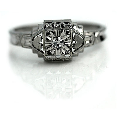 Solitaire Diamond Engagement Ring with Heart Motif