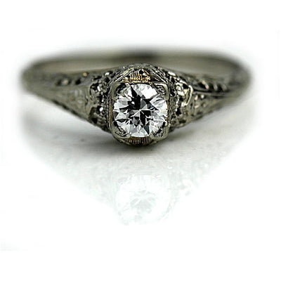 Solitaire Diamond Ring with Filigree Engravings 