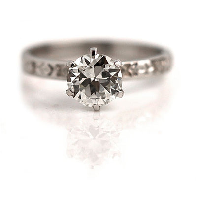 Vintage Solitaire Engagement Ring with Engraved Band