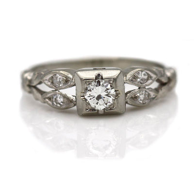 Art Deco Engagement Ring with Navette Framed Side Stones