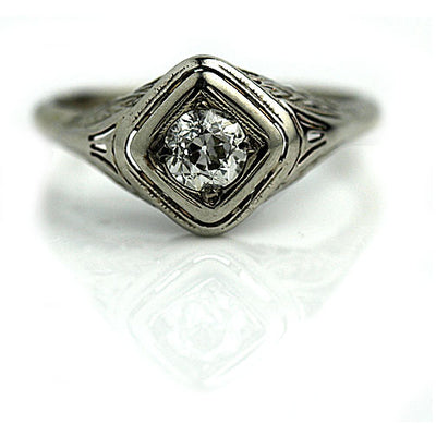 Solitaire Diamond Engagement Ring with Open Metal Work 