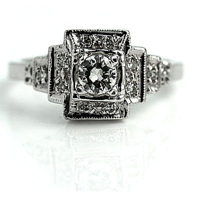 Halo Engagement Ring with Tiered Side Diamonds