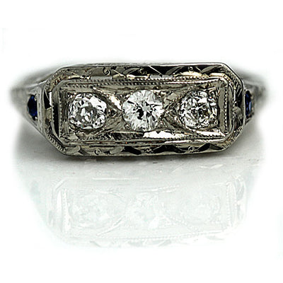 Unique Diamond & Sapphire Engagement Ring with Heart Motif 